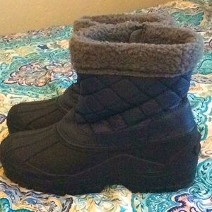 Navy blue and black snow boots